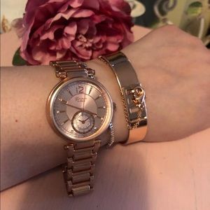 Used,Geneva platinum watch, bangle rose gold tone